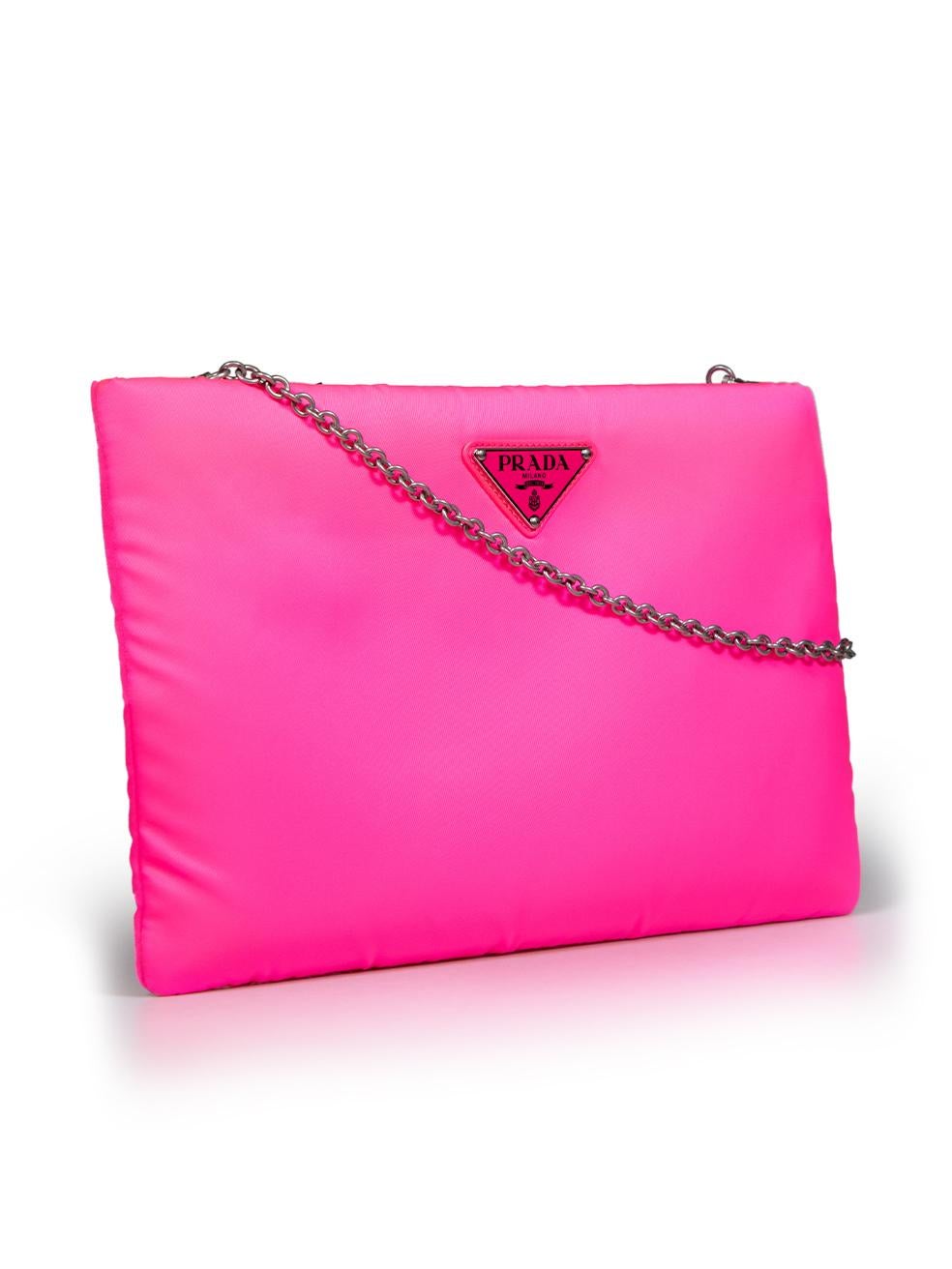 CONDITION is Very good. Minimal wear to the clutch is evident. Minimal marks on the front and the rear right corner of this used Prada designer resale item.
 
 
 
 Details
 
 
 Neon pink
 
 Cloth textile
 
 Medium padded clutch bag
 
 Front logo