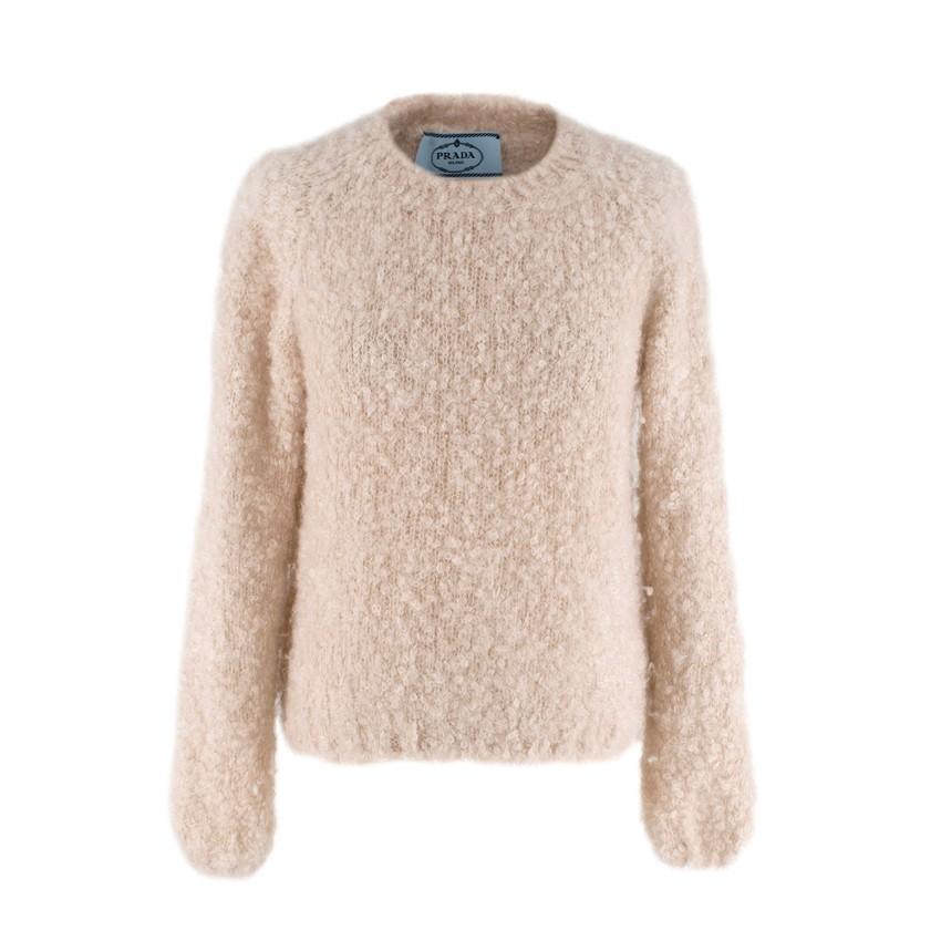  Prada Neutral Bouclé-knit mohair, cashmere and silk-blend sweater

- Beige
- Boucle knitting
- Cropped 
- Cashmere and silk blend
- Ribbed trims
- Elasticated cuffs and hem

Dry Clean

Made in Italy

Material

54% mohair 36% cashmere 10%