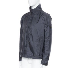 PRADA Nylon 2018 navy enamel triangle rubber logo cuff zip shell jacket IT54