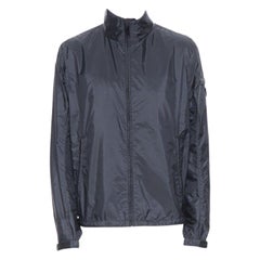 PRADA Nylon 2018 navy enamel triangle rubber logo cuff zip shell jacket IT54