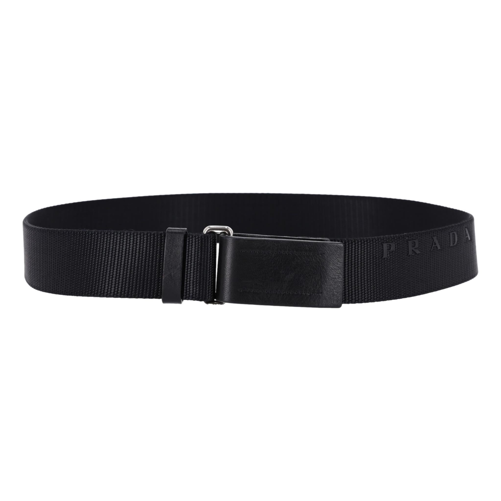 Prada Nylon Logo Belt With Leather Buckle

Black nylon belt with 'Prada' signature to the side.

Classic, leather buckle and adjustable metal closure. Rrp Approx. £420

Size – 90 cm

Condition – Very Good

Composition – Nylon, Leather

Comes with –