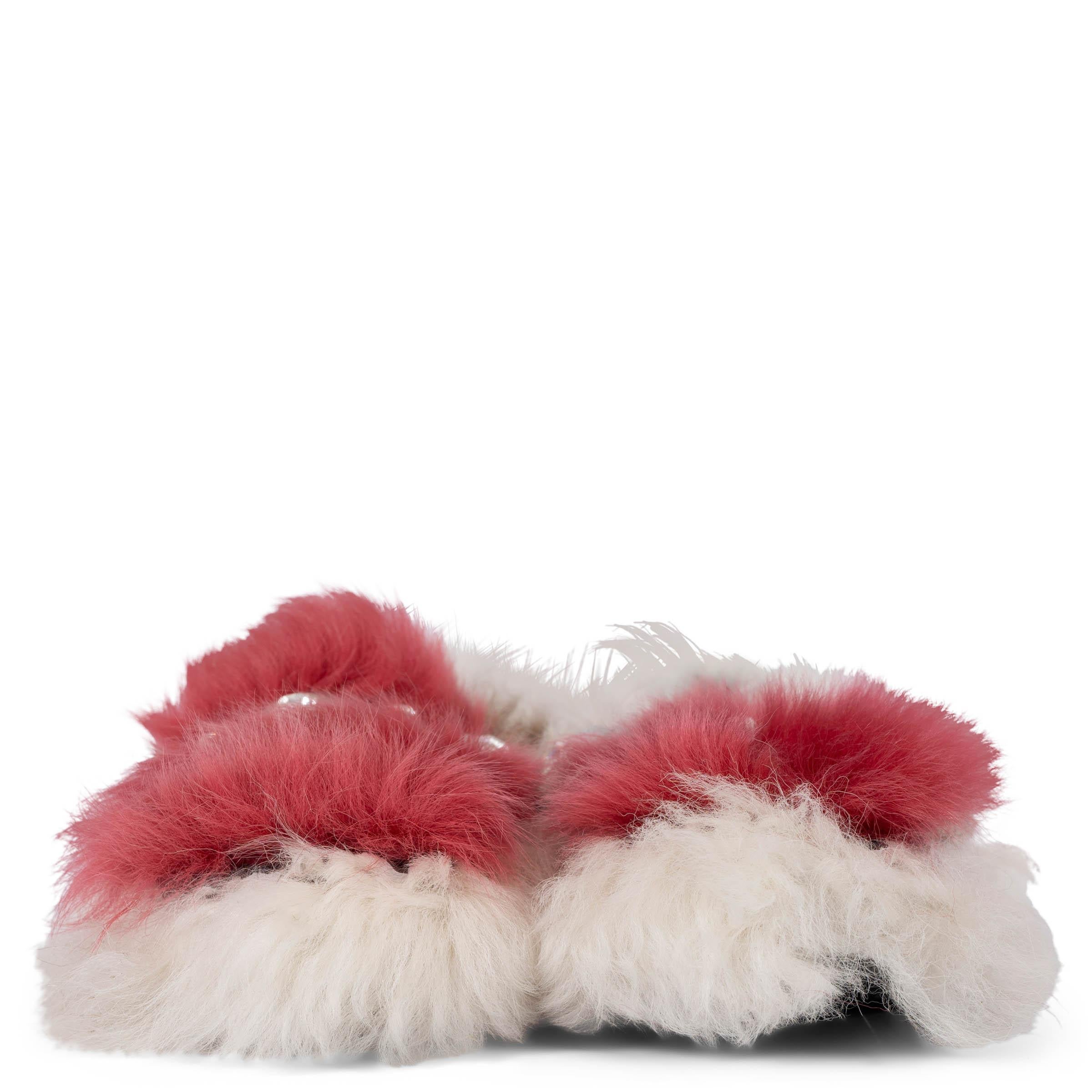 100% authentic Prada moccasins in pink, off-white and brown sheep fur embellished with silver-tone hardware and crystals. Have been worn and are in excellent condition. 

2017 Fall/Winter

Measurements
Imprinted Size	39
Shoe Size	39
Inside Sole	26cm