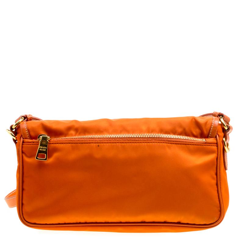 From the house of Prada comes this gorgeous crossbody bag. It has been crafted from nylon and has a zip pocket on the rear. The front flap opens to reveal a well sized interior and the bag is complete with an adjustable shoulder strap.

Includes: