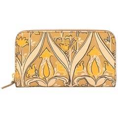 Prada ornate-print saffiano leather continental wallet