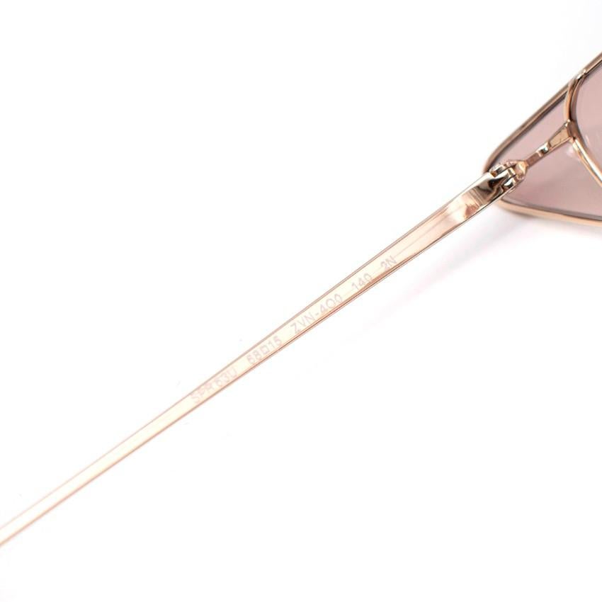 Prada Pale-Gold Triangle Cat Eye Sunglasses 1