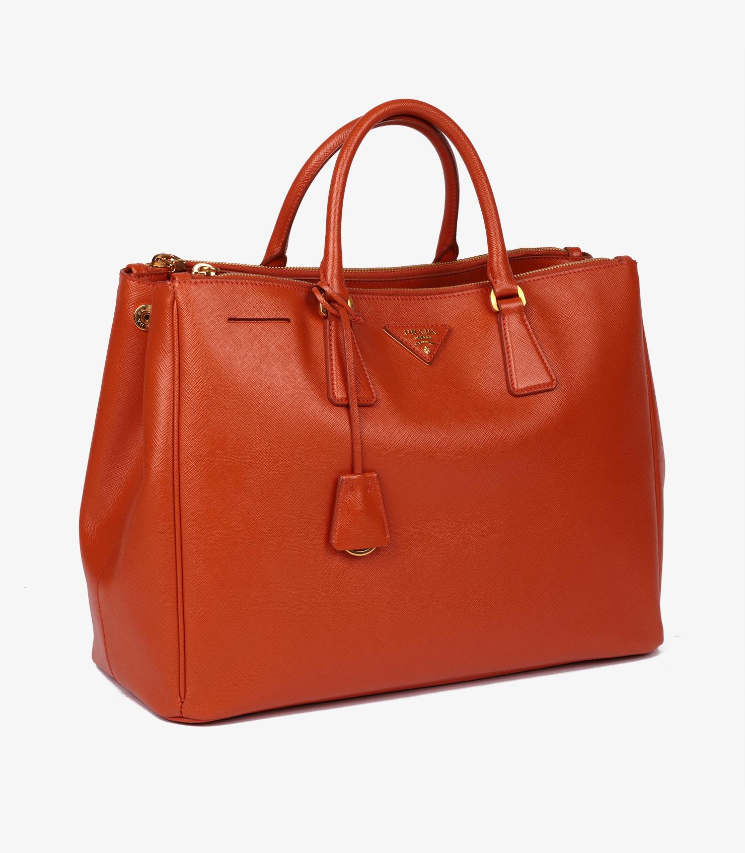 Prada Papaya Saffiano Lux Leather Large Galleria Tote

Product Details
Xupes Ref: CB1275
Brand: Prada
Model: Large Galleria Tote
Type: Tote
Serial Number: 11
Age: 2011
RRP: £3,700
Accompanied By: Prada Dust Bag, Authenticity Card, Care Booklet,