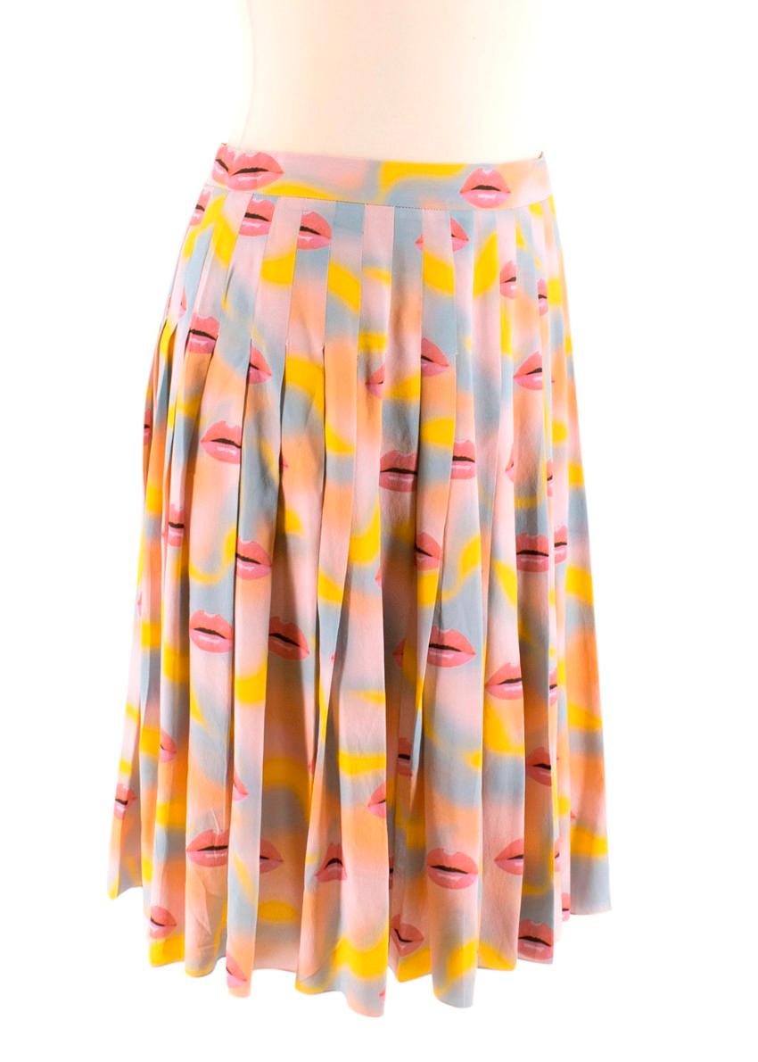 Prada Pastel Lip Print Pleated Skirt

- High waist
- Long pleats
- Pastel yellow, blue, peach background with pink lip print
- Concealed zip/hook closure

Material
No care label but is believed to be silk
Dry clean only 

Made in Italy

Please note,