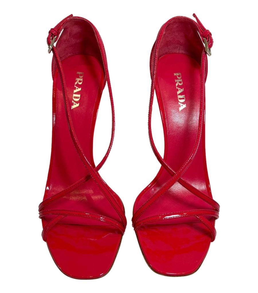 Prada Patent Leather Sandals
Red strappy heels designed with buckled ankle closure.
Featuring open toe, stiletto heel and leather lining.
Size – 38.5
Condition – Very Good
Composition – Patent Leather
Comes with – Box, Dust Bag
