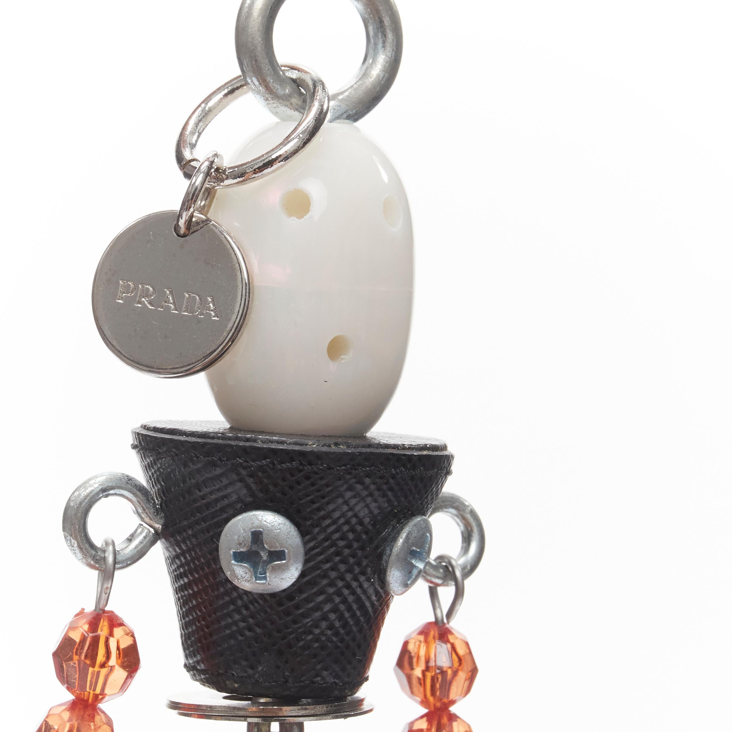 PRADA pearl resin head beaded arms saffiano bolt hardware keychain bag charm 1