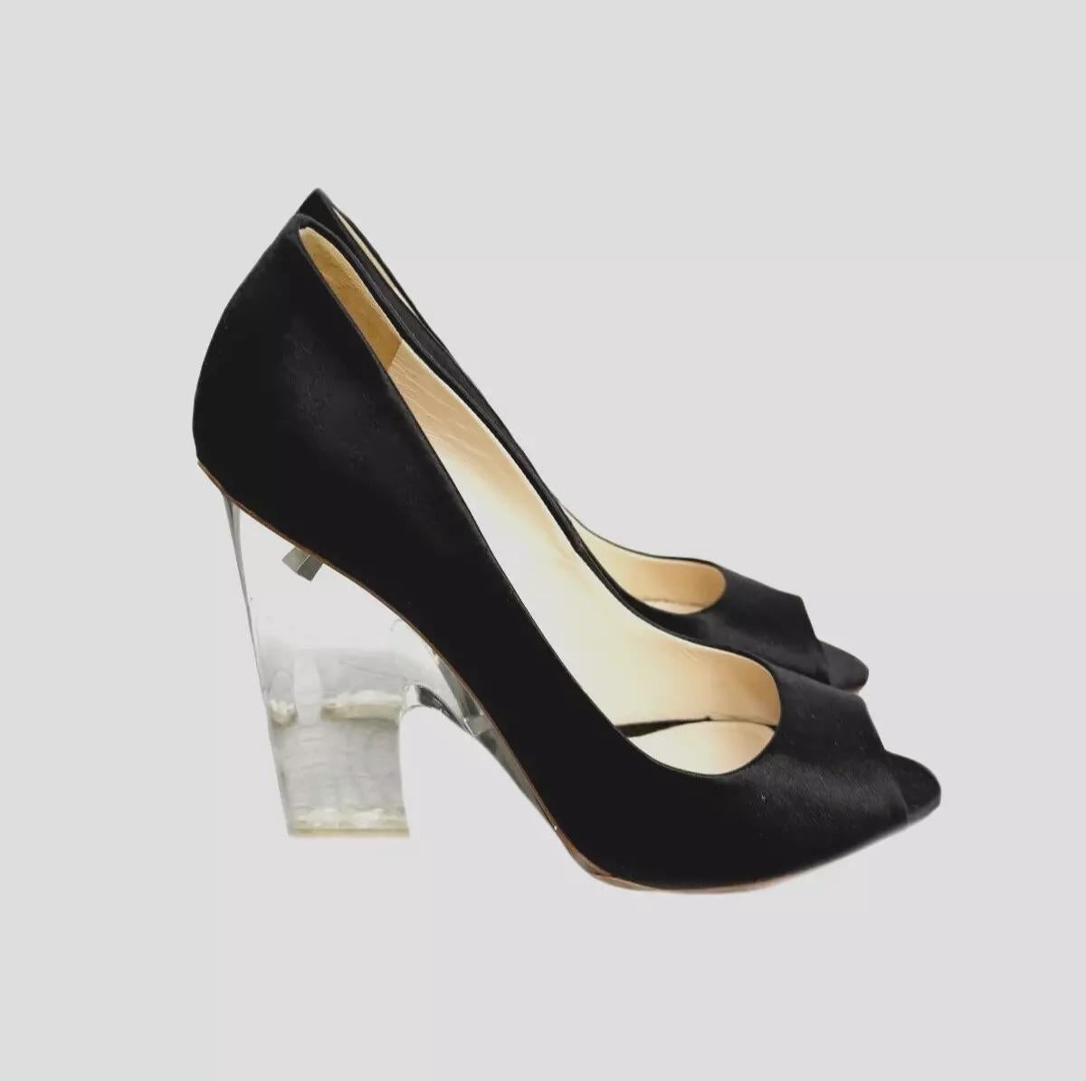 Pre owned -Prada elegant shoes in black satin with transparent heel, open toe model. 

Material: Satin/ Cloth
Made in Italy
Color: Black
Condition: Great
Style: Peep toe pumps
Heel: Transparent, see through 
Heel height: 4.5 inch
Condition:
