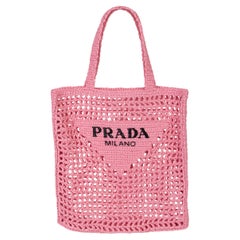 PRADA Borsa Prada in rafia rosa petalo con logo CROCHET