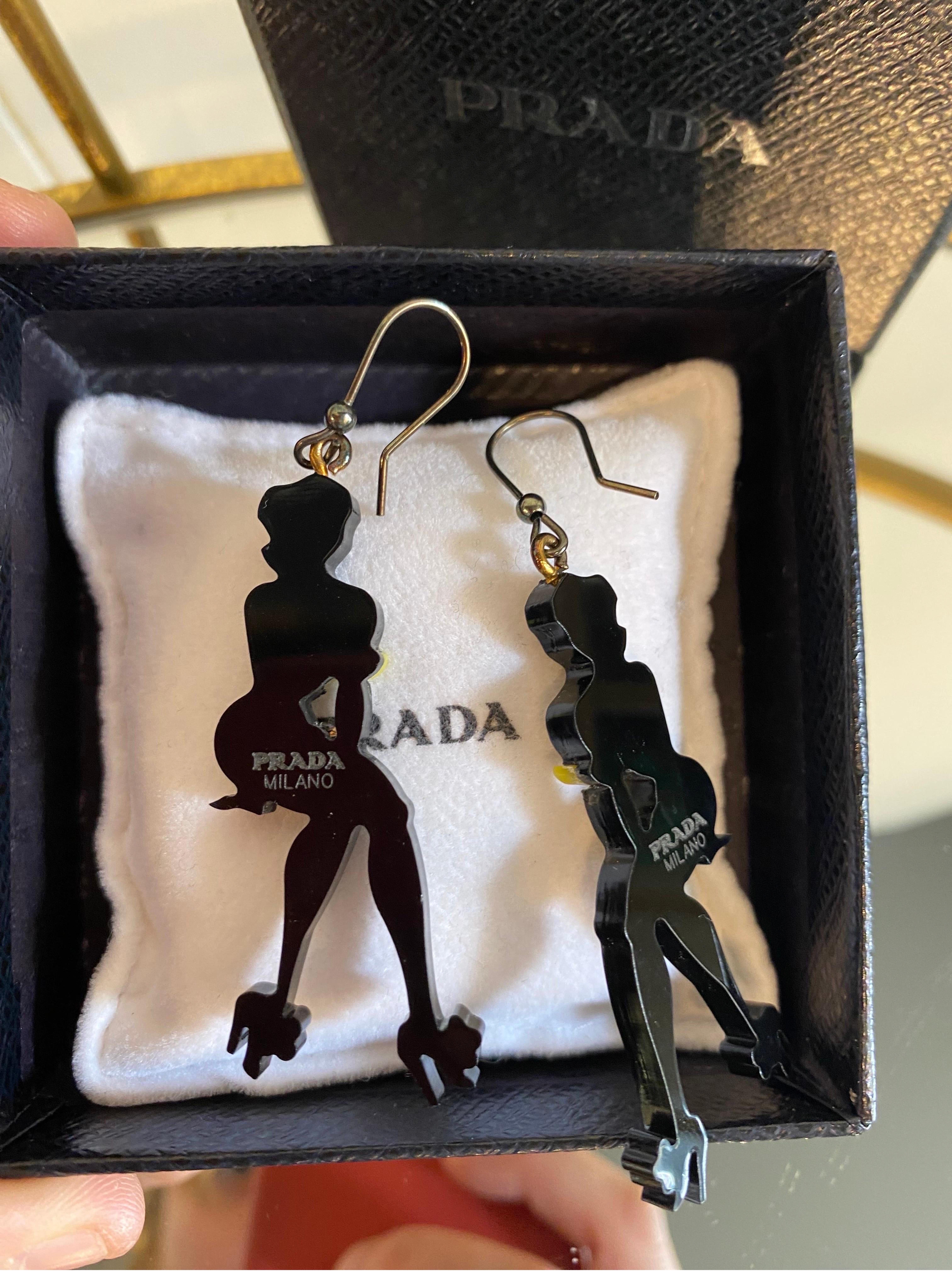 Women's or Men's Prada Pin Up dangle earrings.
SS 2011 collection.