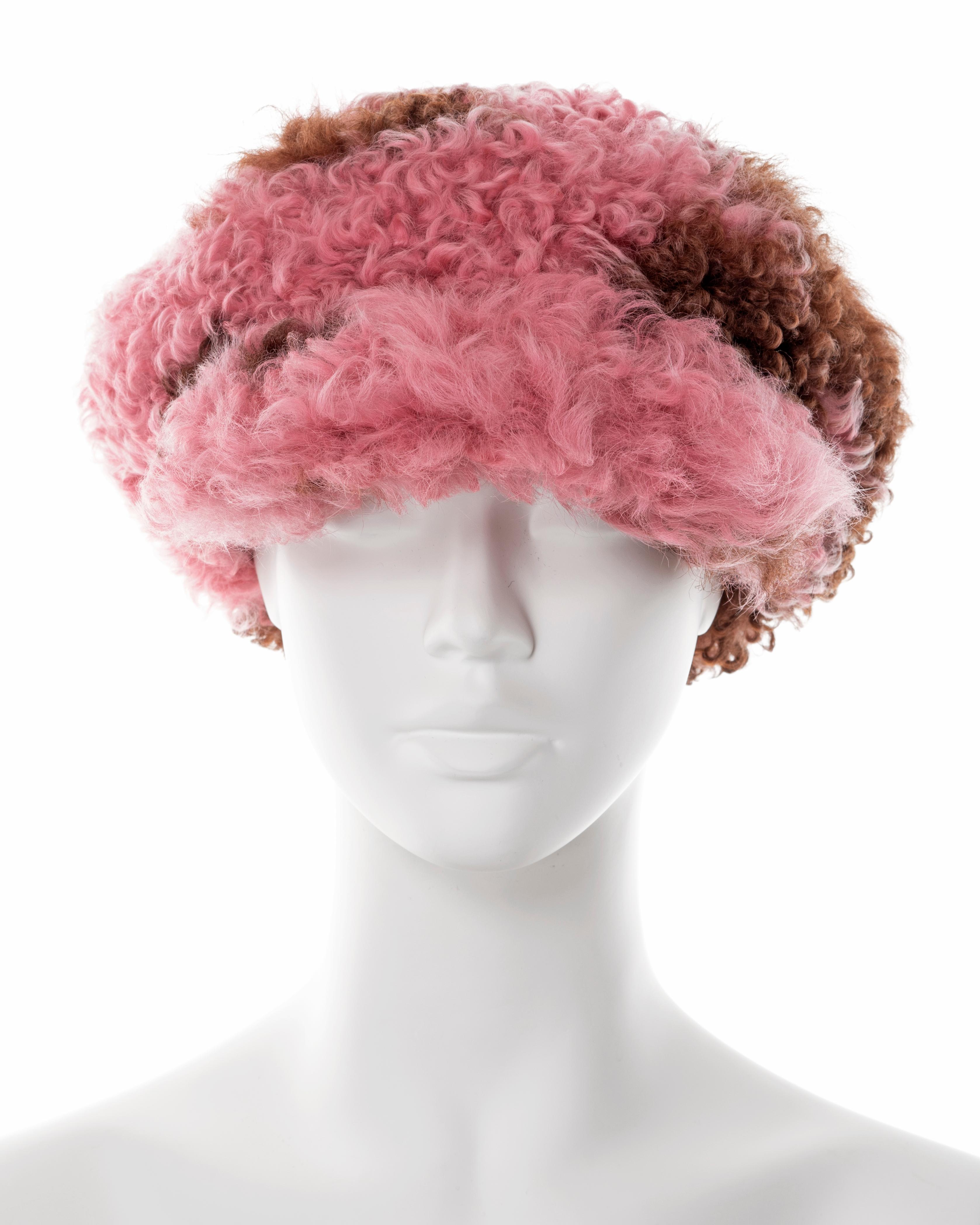 ▪ Prada 'newsboy' hat 
▪ Sold by One of a Kind Archive
▪ Fall-Winter 2017
▪ Constructed from pink and brown curly shearling 
▪ Brown silk lining 
▪ Size Medium
▪ Made in Italy

All photographs in this listing EXCLUDING any reference or runway
