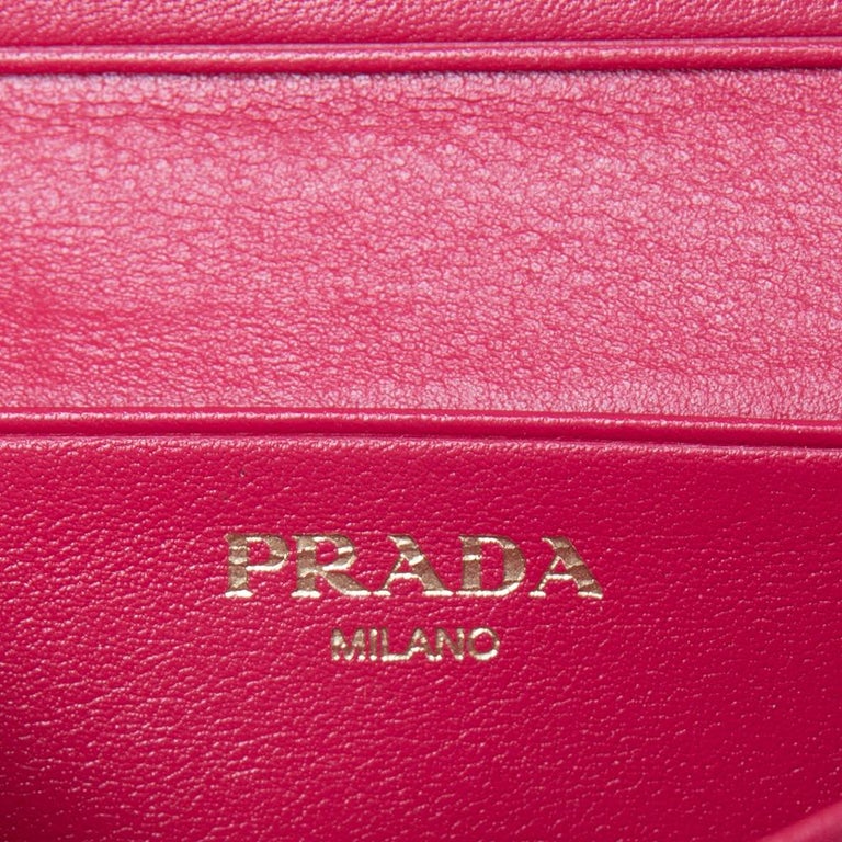 This exquisite card holder from the house of Prada shows that style can come in small things too. Made from leather, it features a logo-adorned flap that opens up to a leather interior for your cards.

