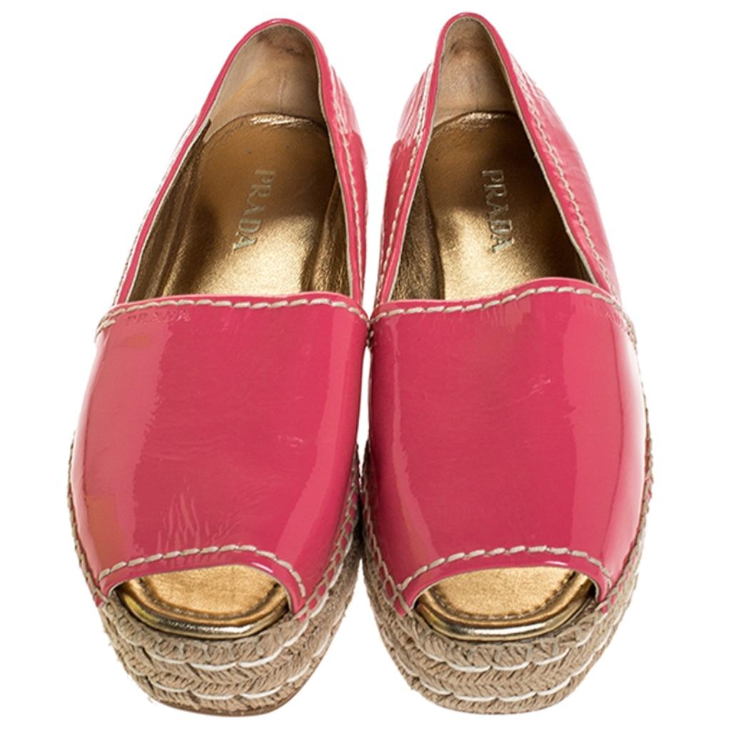 These trendy and chic espadrille platforms from Prada will elevate your casual outfits instantly. Crafted from patent leather, they come in a lovely shade of pink. They feature peep toes, 5 cm platforms, leather lining, insoles and rubber soles.