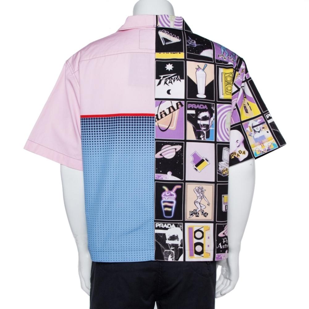 This Prada shirt features retro-futuristic graphics that reflect on the ‘90s. It has a 50/50 all-over print that’s split vertically at the center, whereby the left side features a typographic Prada logo, with the right side featuring collaged