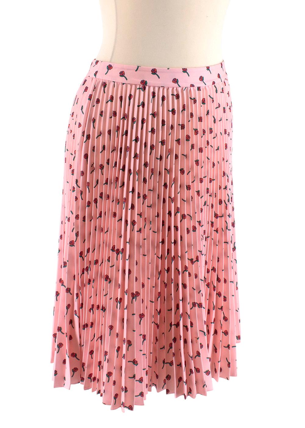 Prada Pink Roses Print Pleated Skirt

- Made of soft satiated crepe 
- Gorgeous roses print 
- Beautiful pink hue 
- Classic cut 
- Zip fastening to the side 
- Pleated surface 
- Elegant versatile design 

Materials:
100% polyester 

Dry clean only
