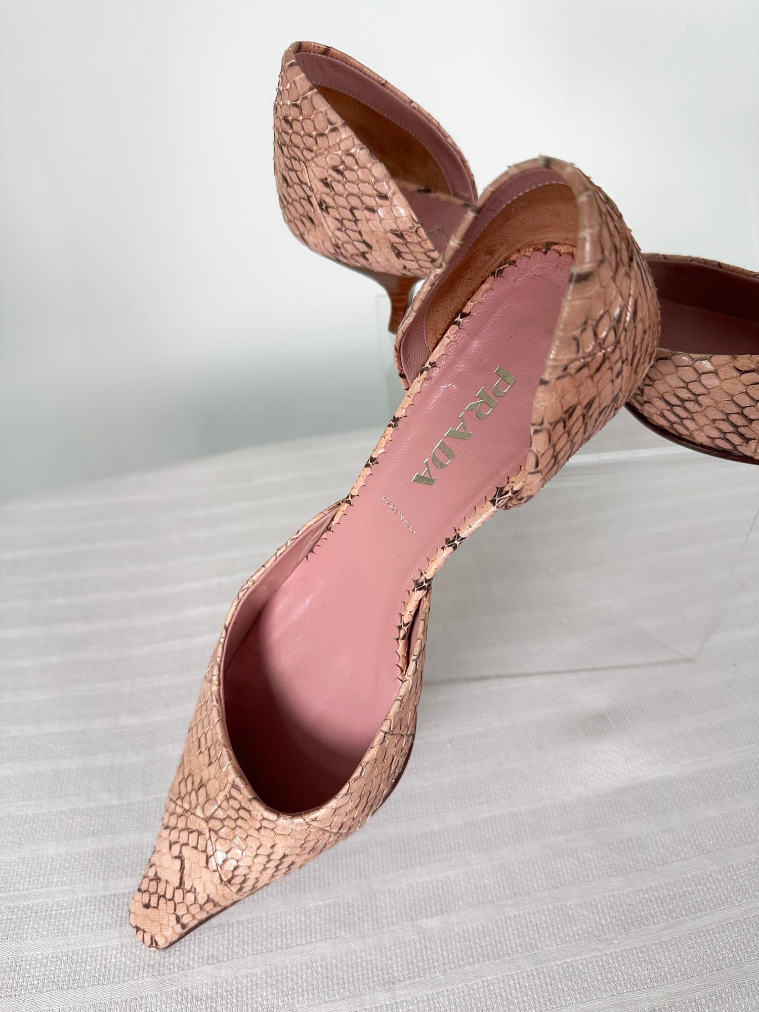 Prada pink snakeskin D'Orsay kitten heel pumps marked size 37 1/2. Pointed square toe pumps have stacked natural leather kitten heels. Leather soles and interior. Pre owned and well cared for, they are in very good condition, together with protector