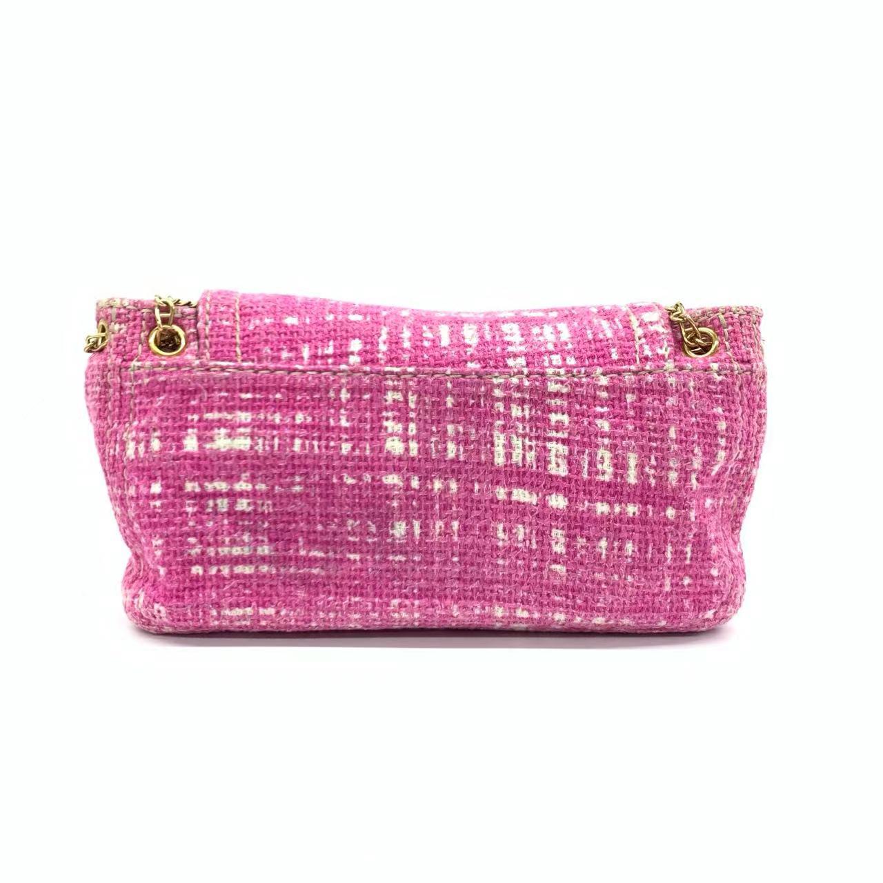 Prada Pink Sound Lock Tweed Shoulder Bag
These are professional photos of the actual bag.
  CONDITION: VERY GOOD
  This previously owned and used item is in good condition with some signs of use. Light rubbing or stains on the corners of the bag.