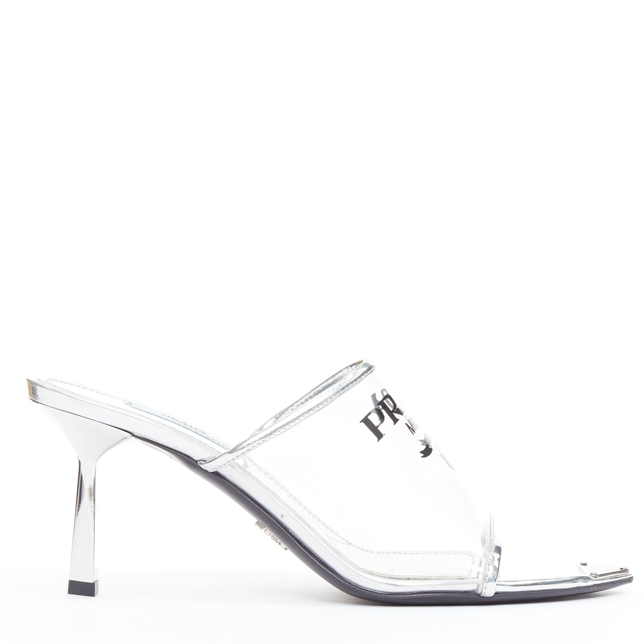 PRADA Plexiglass logo print clear PVC triangle toe mule heels EU37.5
Reference: TGAS/E00955
Brand: Prada
Designer: Miuccia Prada
Material: PVC, Leather
Color: Clear, Black
Pattern: Solid
Closure: Slip On
Lining: Black Leather
Extra Details: