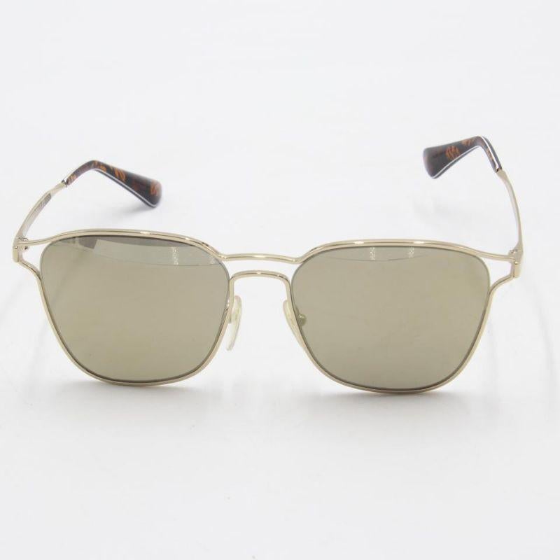 Prada Polished Gold SPR 54T Finish Frame Aviators Unisex Sunglasses

These chic Prada sunglasses have a thin Polish Gold finish with Black ear sleeves and PRADA print lenses. The arms are narrow with polished gold with PRADA brand. These are perfect