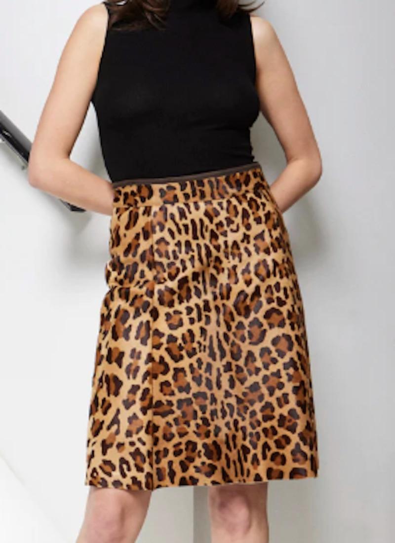 Iconic Leopard Prada Pony Hair Skirt
Waist 28 in
Hips 39 in
Length 22 in 
Marked Size IT 38 
Can accommodate sizes US 2-4
Excellent Vintage Condition. Measurements are taken flat. Model is 5 ft 9 in and size 2/4.