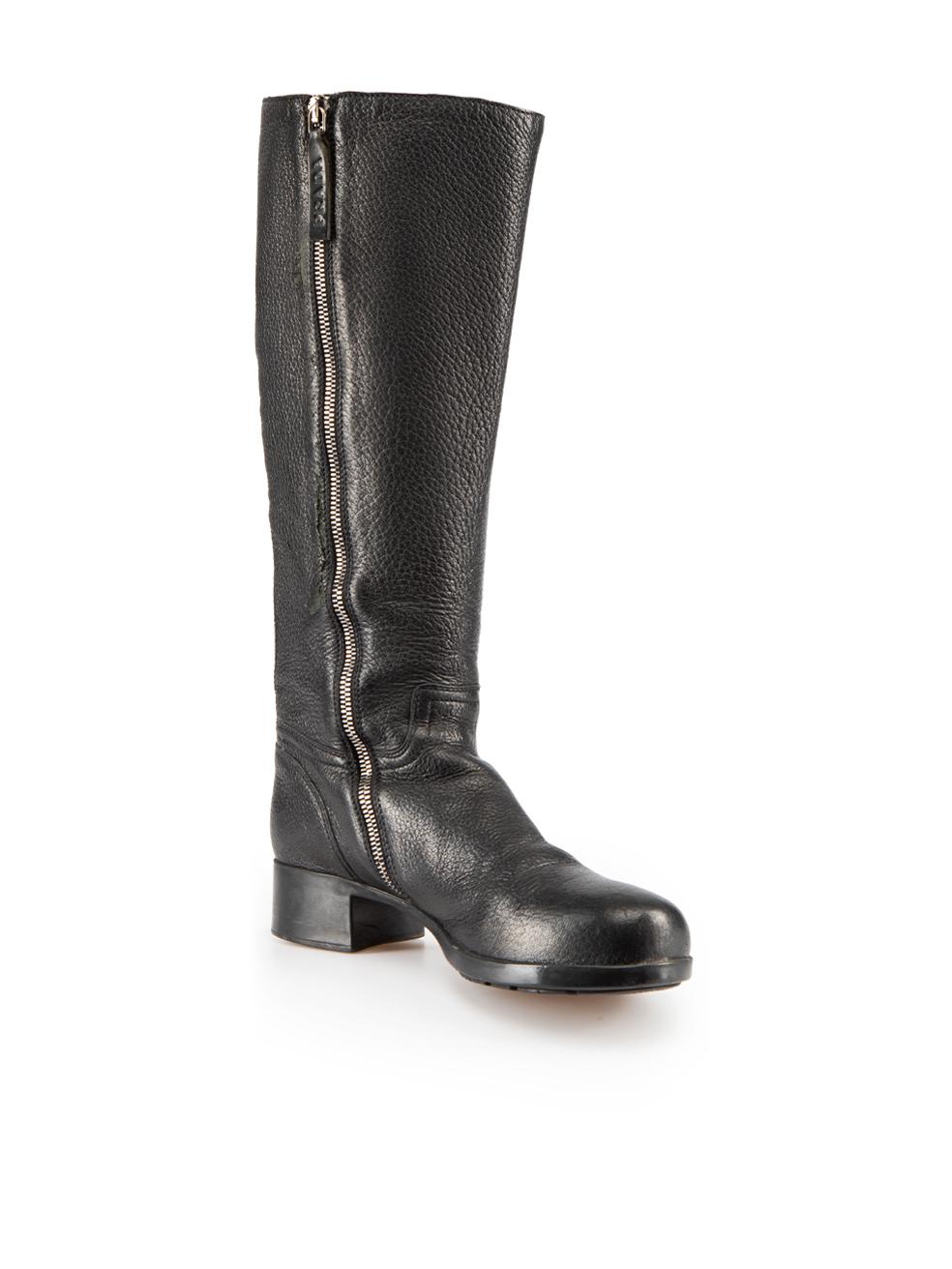 CONDITION is Good. Minor wear to boots is evident. Light scuffing to leather on toe caps and leg of boots, with minor tarnishing to hardware on this used Prada Sport designer resale item.
  
Details
Black
Leather
Boots
Knee high
Mid heel
Round