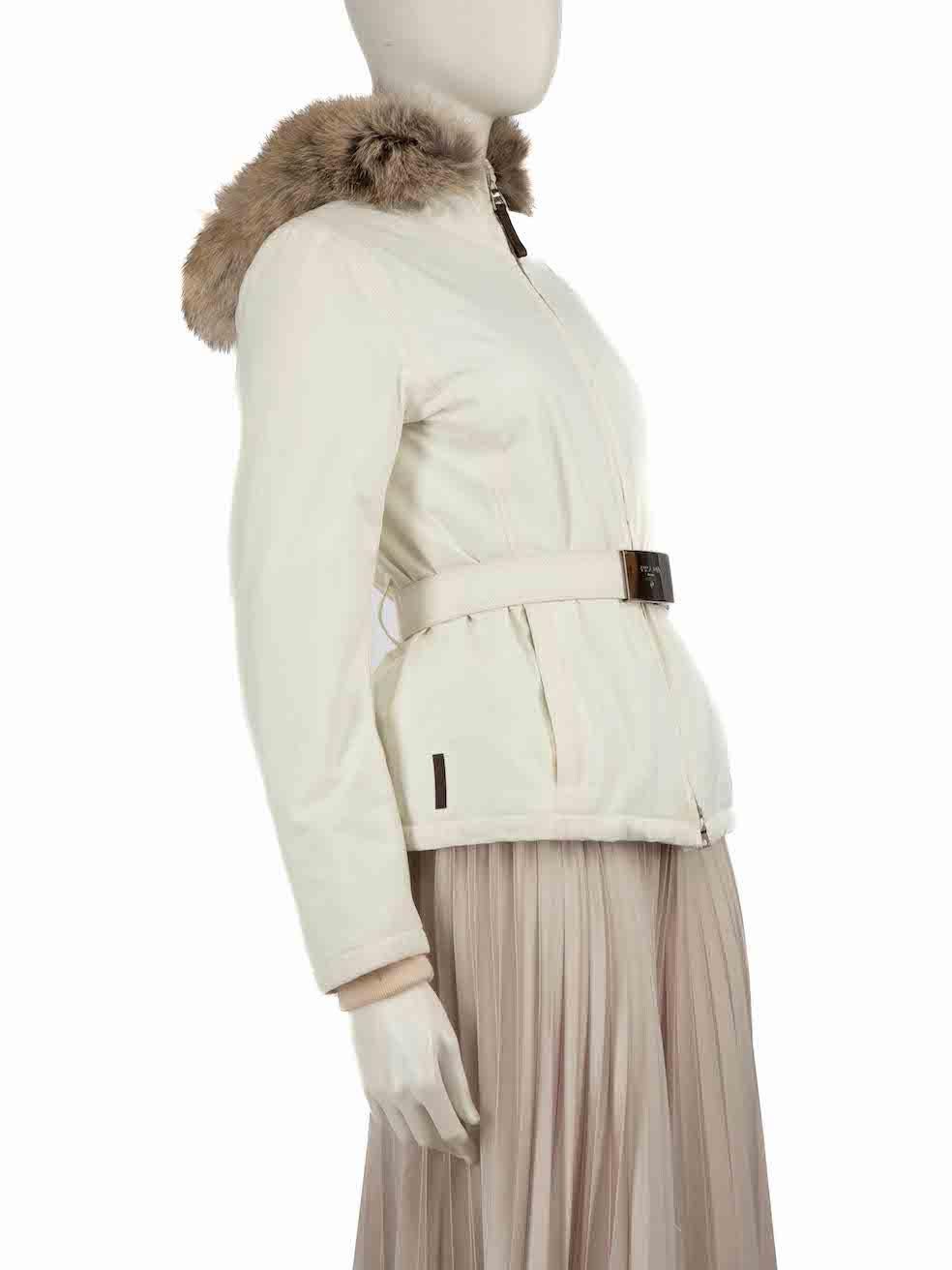 CONDITION is Very good. Minimal wear to coat is evident. Minimal wear to the belt buckle with scratches. Discolouration on the cuffs, right sleeve and neck on this used Prada Sport designer resale item.
 
 
 
 Details
 
 
 White
 
 Polyester
 
 Ski