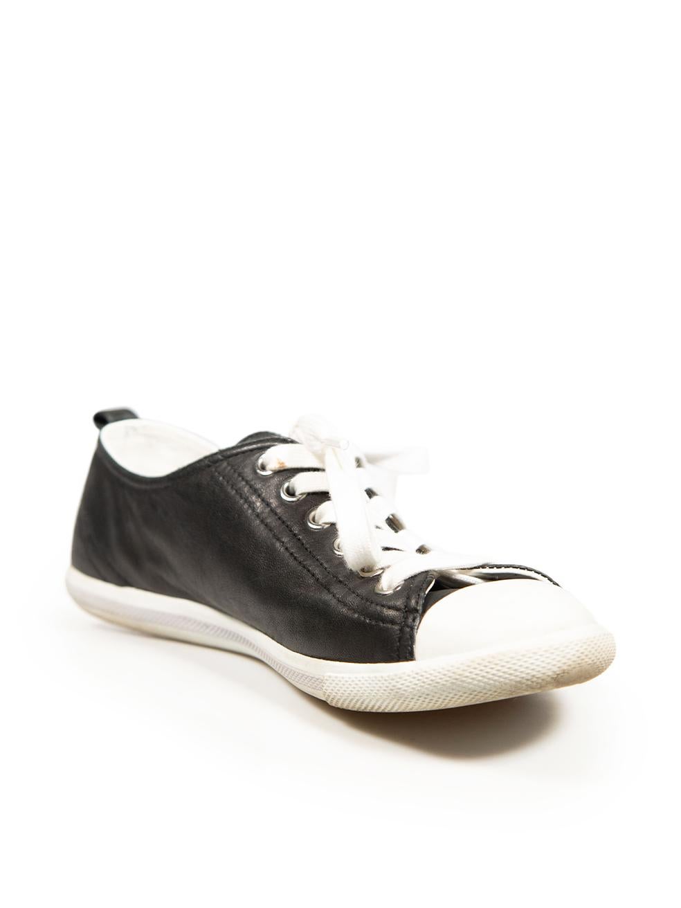 CONDITION is Very good. Minimal wear to trainers is evident. Minimal wear to white rubber sole of both shoes where scuffs is evident. A stain is visible to the left shoe lace on this used Prada Sports designer resale item. This item comes with