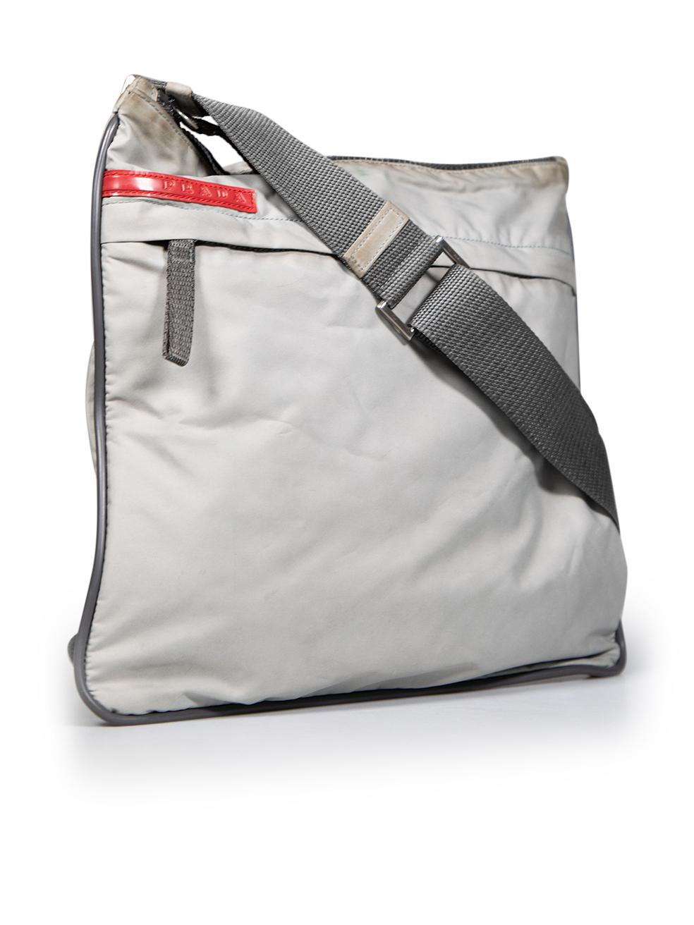 CONDITION is Good. Minor wear to bag is evident. Light signs of wear with discolourations all over, expacially on the top seam at the zip on this used Prada Sports designer resale item.
 
 
 
 Details
 
 
 Grey
 
 Polyester
 
 Medium crossbody bag
