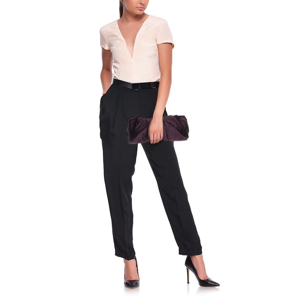 This Prada clutch for women has the kind of design that ensures high appeal whether held in your hand or tucked under your arm. It is a meticulously crafted piece bound to last a long time.