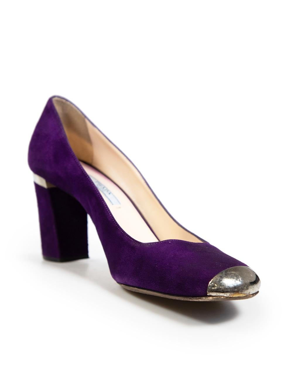 CONDITION is Good. General wear to heels is evident. Tarnishing and abrasions to the hardware of the tips, loose stitching of topline on the left side of the right shoe. Abrasions to the suede exterior of the back counters and heels of both shoes on