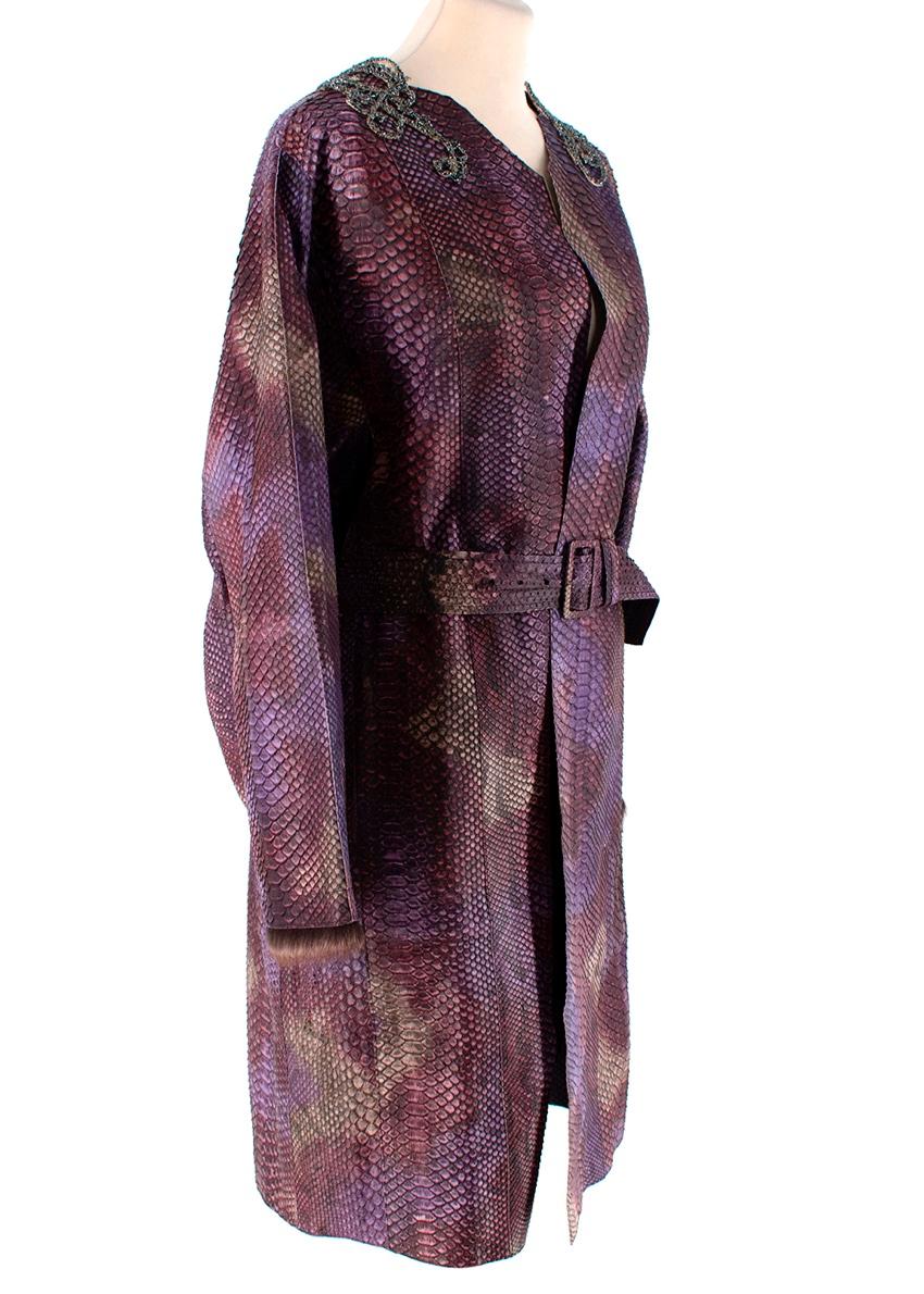 Prada Python Pink & Purple Toned Lightweight Jacket
 

 -Prada python lightweight collarless jacket with a belt 
 - Hues of purple & pink Burmese python jacket
 -Malmot fur cuffs 
 -Two inset pockets 
 -Open style no buttons
 -Hand-stitched