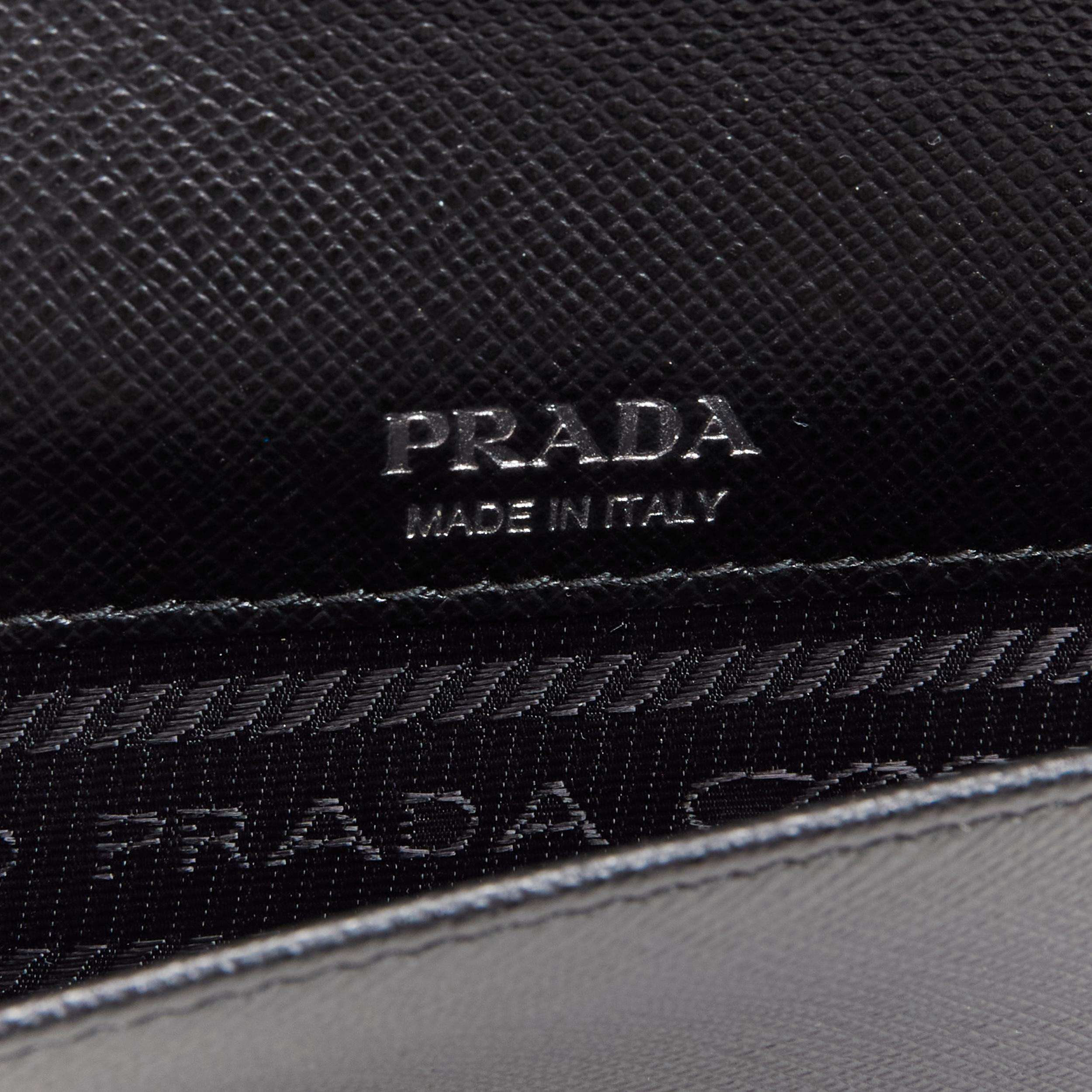 PRADA Racing Graphic Logo black saffiano flap front pocket flat top handle bag For Sale 4