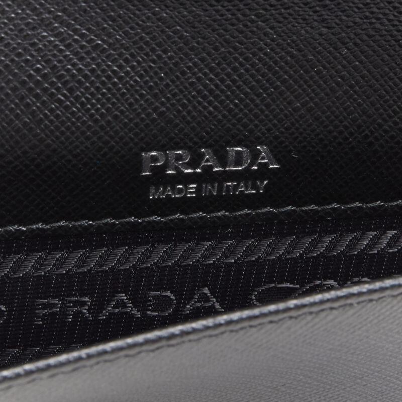 PRADA Racing Graphic Logo black saffiano flap front pocket flat top handle bag For Sale 4