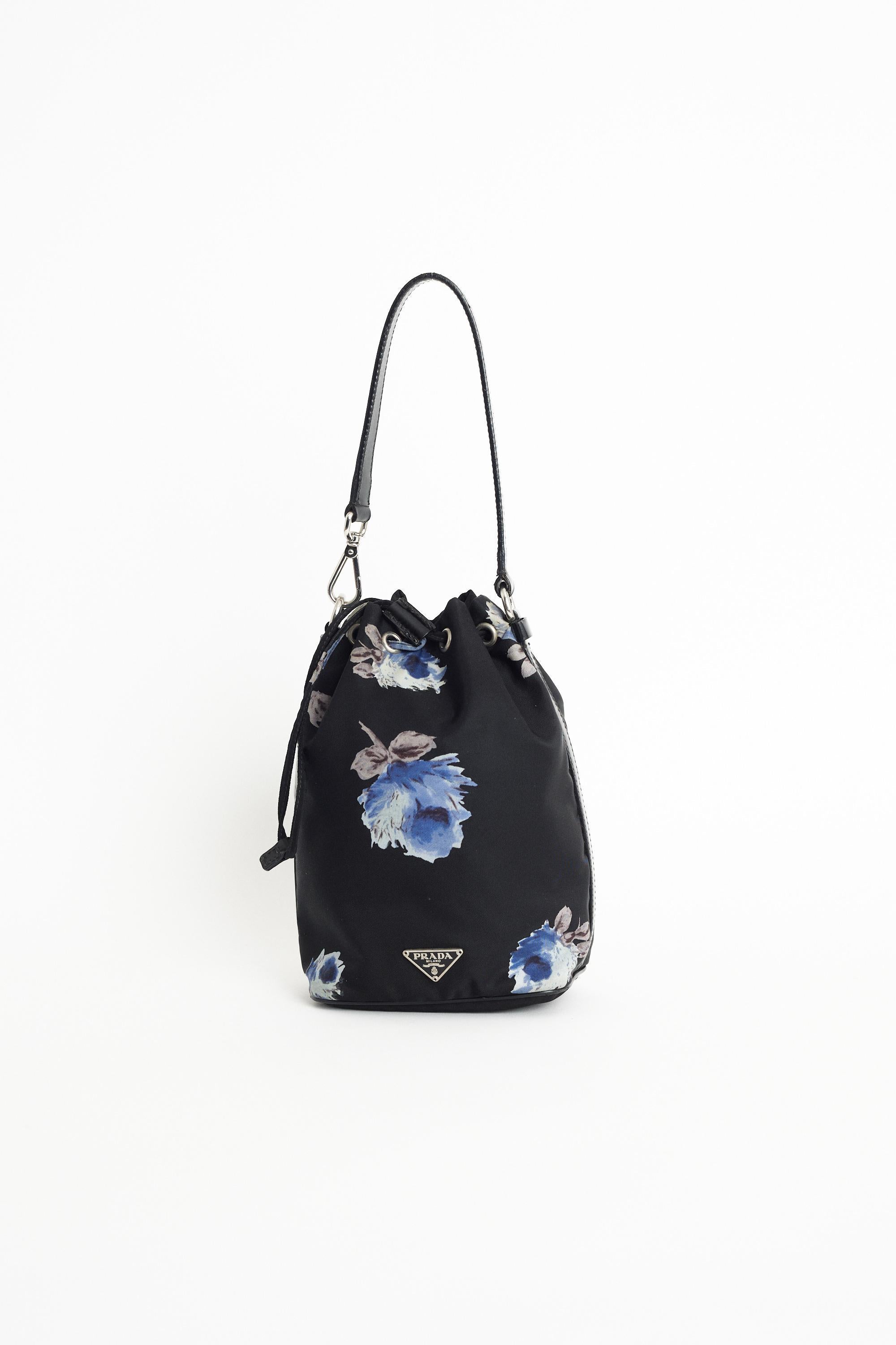 We are very excited to present this Prada rare nylon floral bucket bag. Features soft structure, Prada hardware, removable strap and drawstring closure. Pre-loved, in excellent vintage condition. Authenticity guaranteed.

Fabric: Nylon
Dustbag: