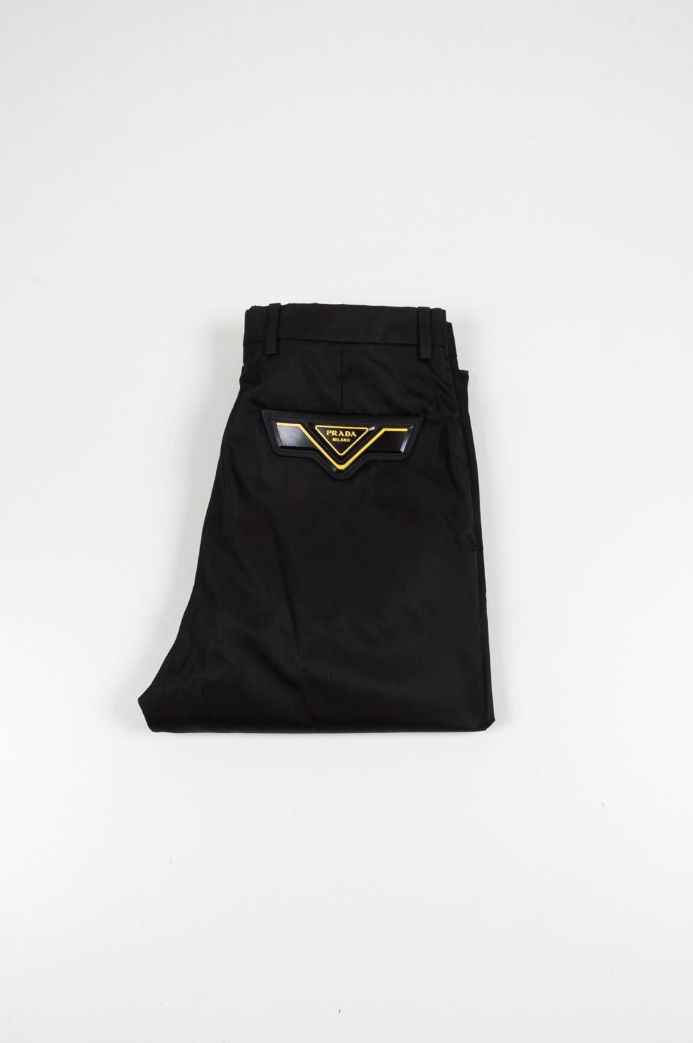 Item for sale is 100% genuine Prada Men RE-NYLON Pants, S317
Color: Black
(An actual color may a bit vary due to individual computer screen interpretation)
Material: 100% polyamide
Tag size: ITA46 (S/M)
These pants are great quality item. Rate 8.5