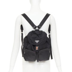 PRADA Re-Nylon TEchnical silver triangle buckle dual pocket small backpack bag