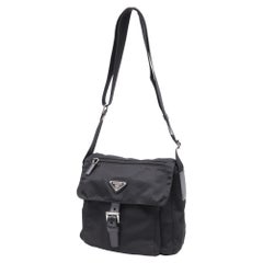 Prada Re-Nylon Vela Single Buckled Messenger Bag in Black Polyamide