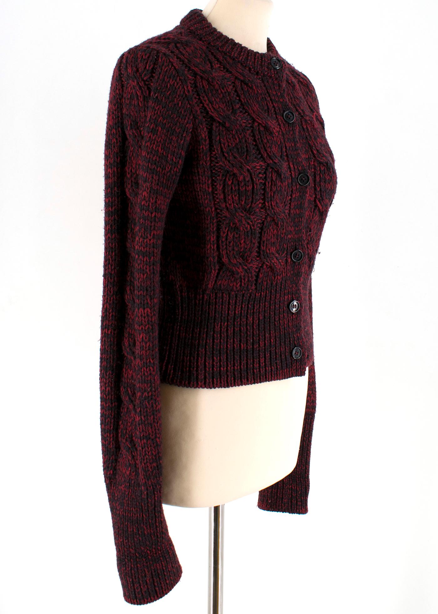  Prada Red & Black Wool Knit Crop Cardigan

- red and black wool knit cardigan 
- round neckline
- button fastening to the front
- crop length
- unlined

Please note, these items are pre-owned and may show some signs of storage, even when unworn and