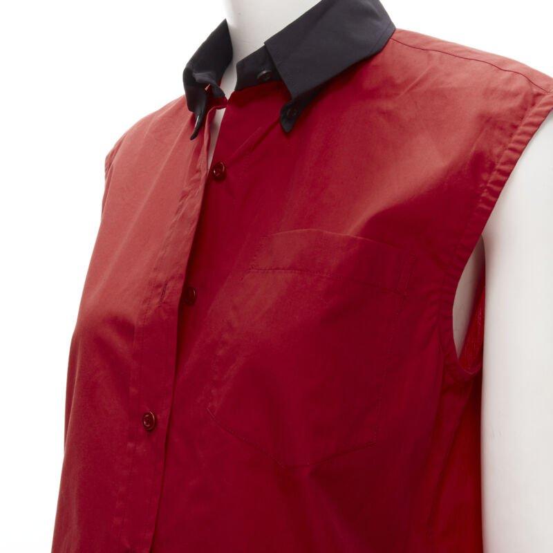 PRADA red contrast black collar boxy sleeveless vest shirt S
Reference: ANWU/A00628
Brand: Prada
Designer: Miuccia Prada
Material: Feels like cotton
Color: Red, Black
Pattern: Solid
Closure: Button
Extra Details: Patch chest pocket Boxy