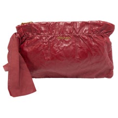 Marsupio Prada in nappa rossa con fiocco e zip in pelle antica
