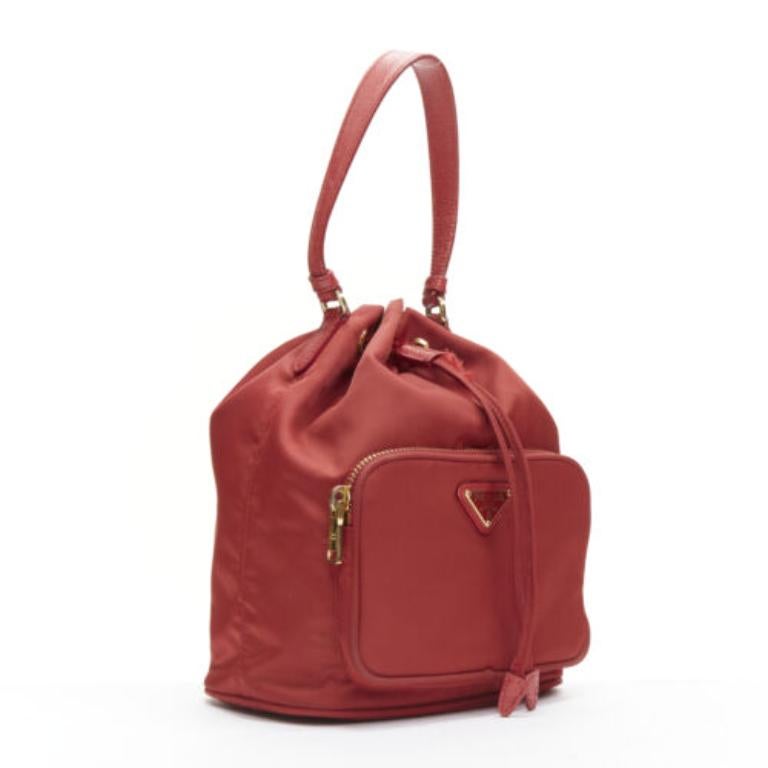 Brown PRADA red nylon gold triangle plate drawstring bucket crossbody shoulder bag