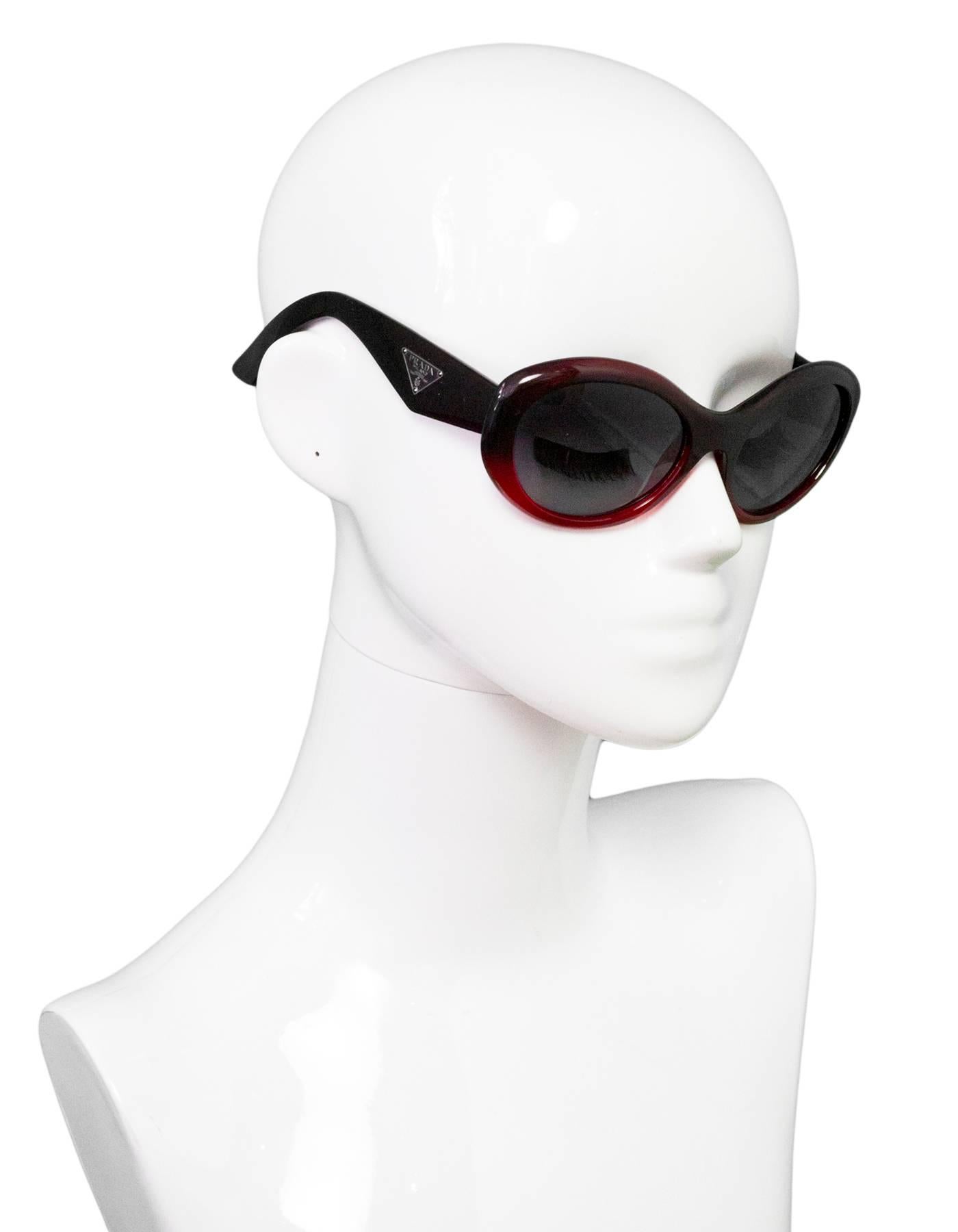 Prada Red Ombre Resin Sunglasses
Features logo at arms

Made In: Italy
Color: Red
Materials: Resin
Overall Condition: Excellent pre-owned condition with the exception of light surface marks 
Included: Cole Haan case

Measurements: 
Across: