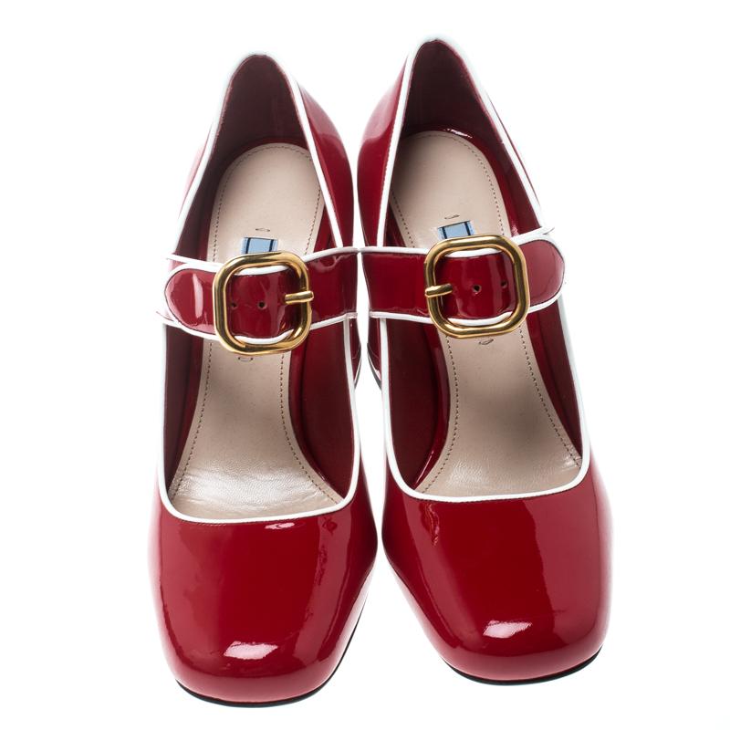 Go retro all the way by owning these stunning pumps today! Crafted from red patent leather, they have been styled with square toes, block heels and straps with buckles. The insoles have been lined with leather and they will offer you