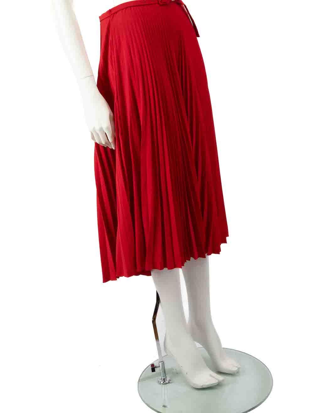 CONDITION is Very good. Hardly any visible wear to skirt is evident. However, the composition label is missing on this used Prada designer resale item.
 
 
 
 Details
 
 
 Red
 
 Synthetic
 
 Skirt
 
 Midi
 
 Pleated
 
 Side zip and hook fastening
