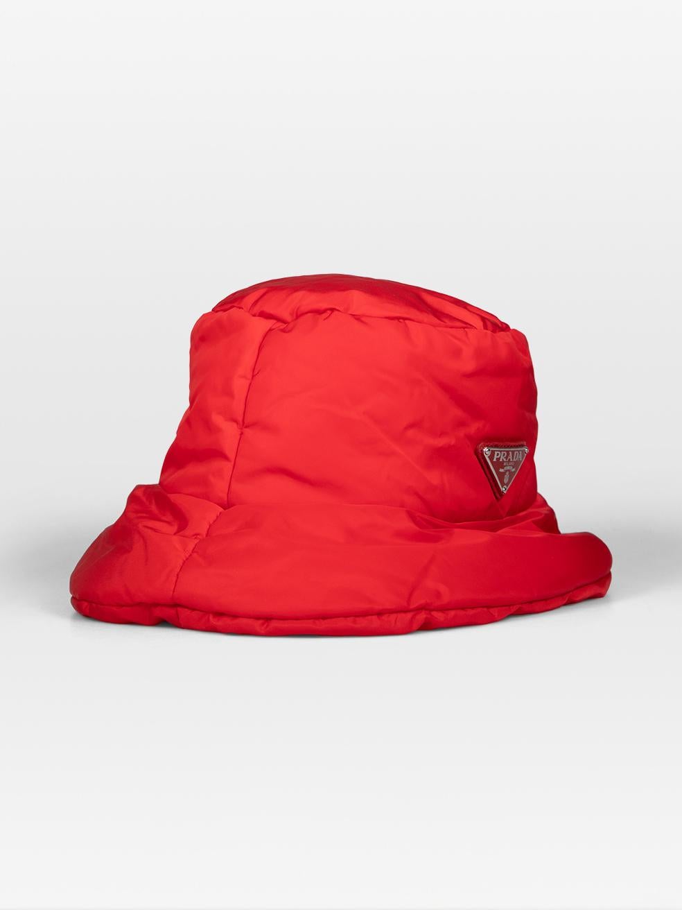 CONDITION is Very good. Minimal wear to thee hat is evident. Discolouration on the inside rim. One side of the label on the inside of the hat is loose on this used Prada designer resale item. Discolouration may need gentle hand wash contrary to dry