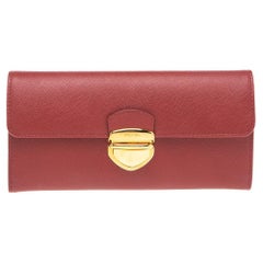 Prada Red Saffiano Tuc Leather Pushlock Continental Flap Wallet