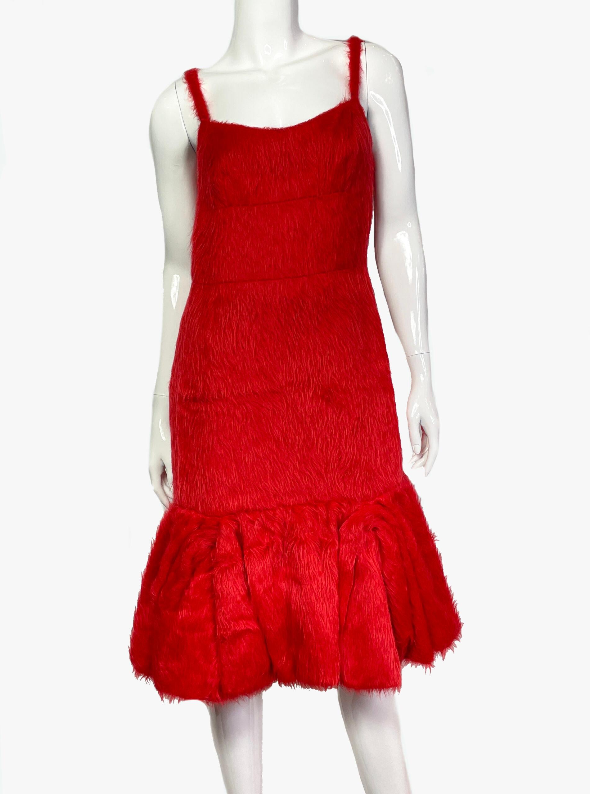 Prada faux fur dress in red color from SS2017 collection. 
Fastens with a zipper.
Size: M
Condition: Very good
........Additional information ........

- Photo might be slightly different from actual item in terms of color due to the lighting during