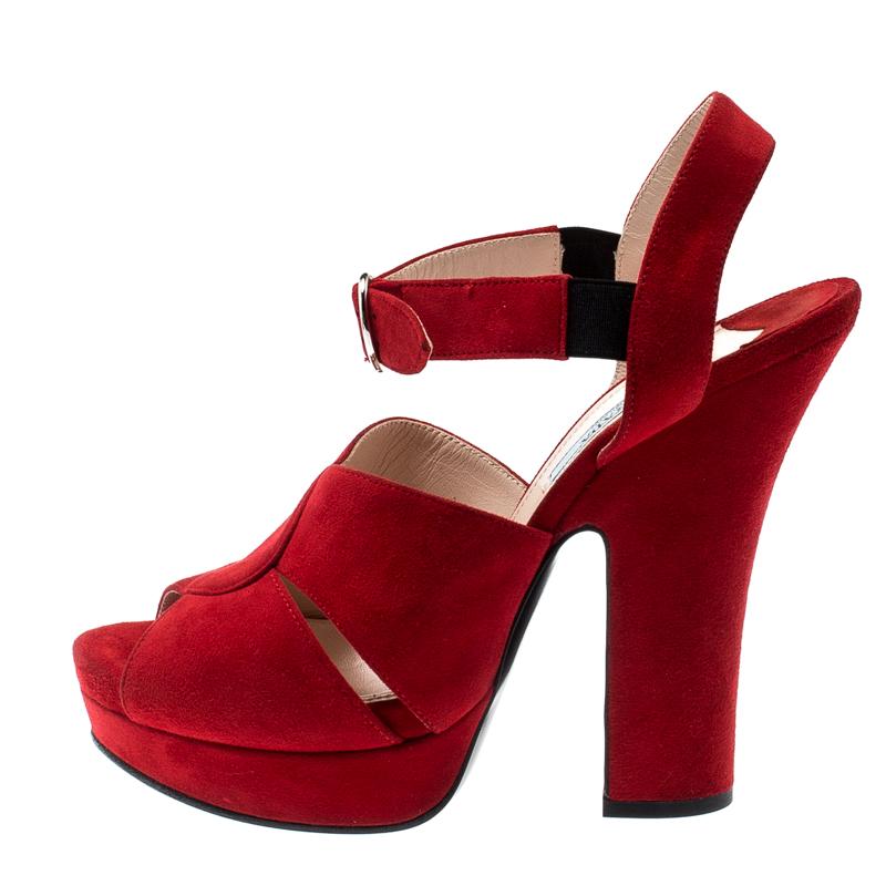 These suede sandals are edgy and chic and are styled with block heels. Embrace your unique side when you wear this pair of sandals with an uber comfortable leather sole. This pair from the house of Prada, in a smart red shade, is perfect for